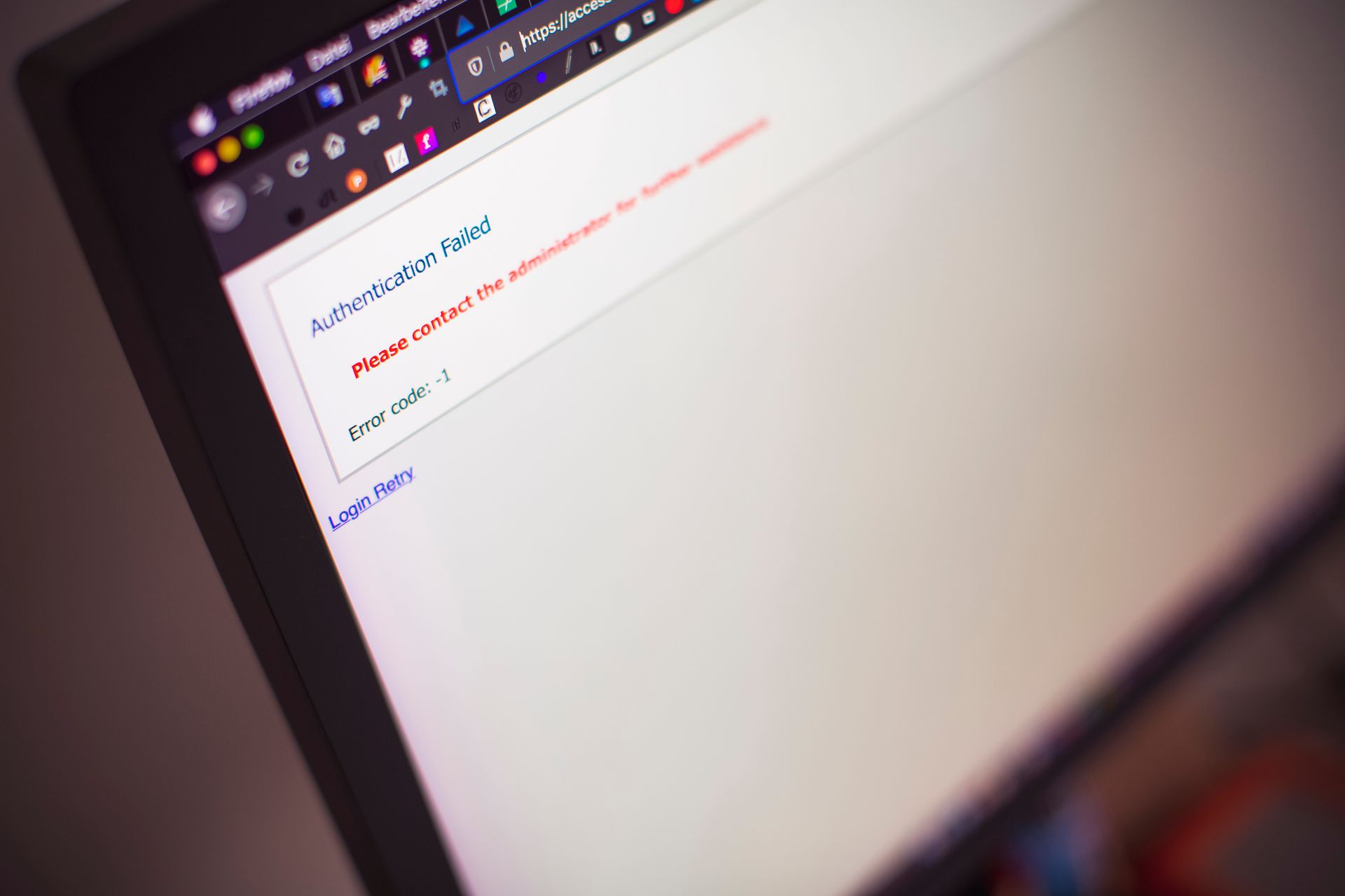 Computer monitor displaying an Authentication Failed message with red text and Error code minus 1